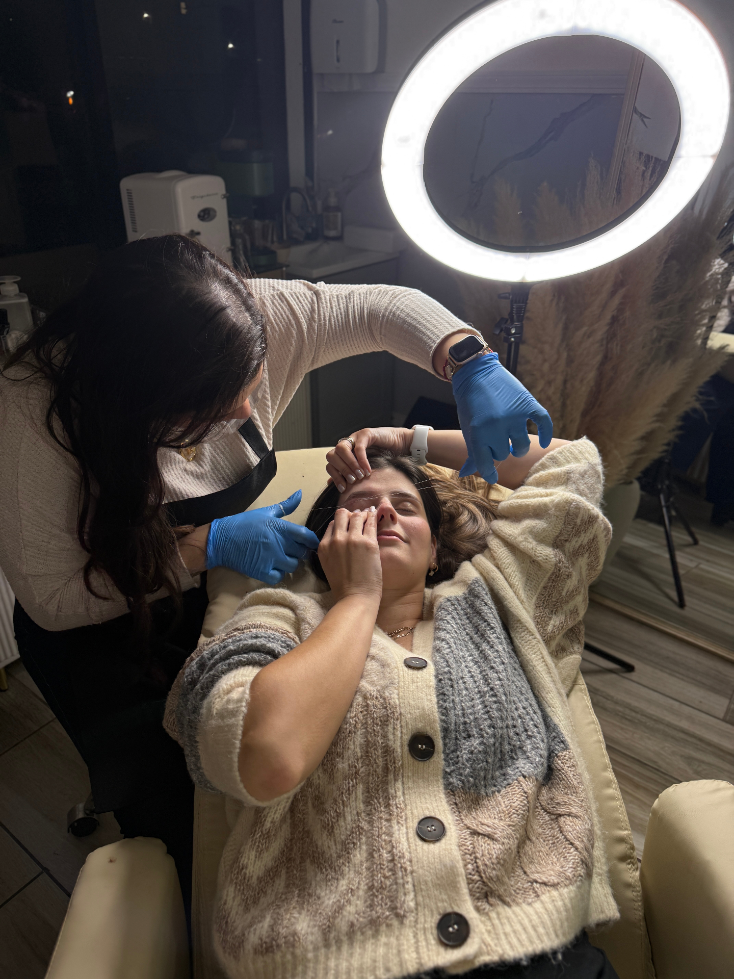 Eyebrow threading session